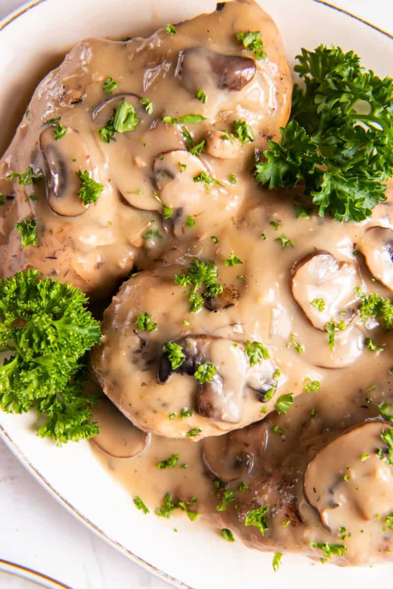 crockpot chicken marsala on a white plate.
