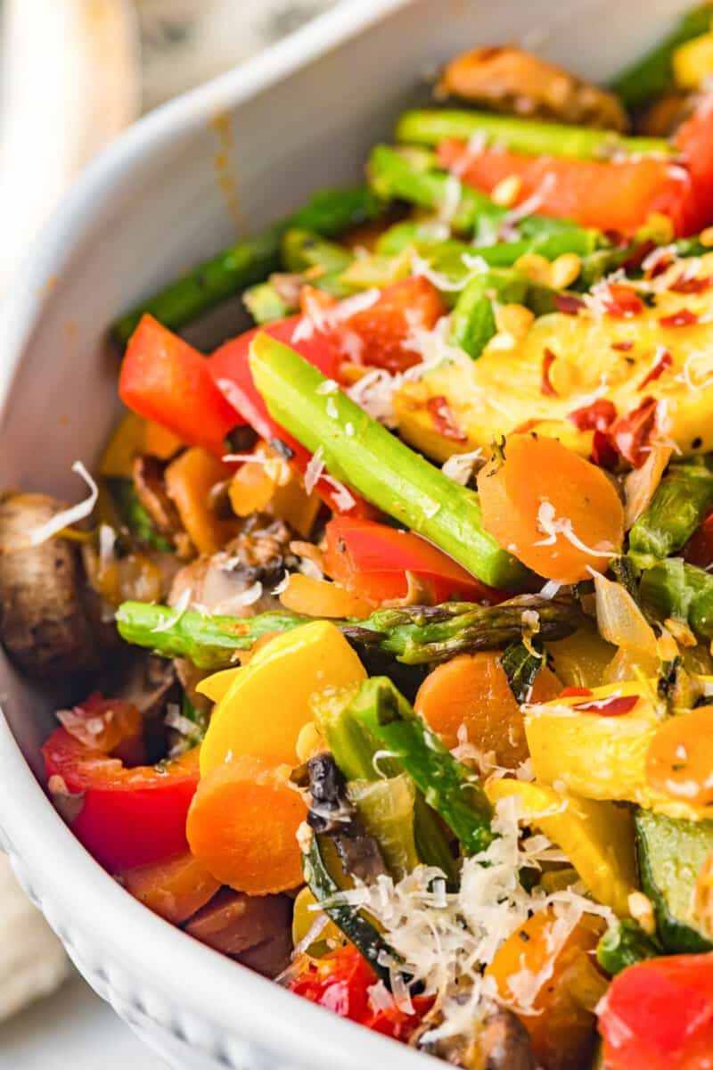 sauteed vegetables in a white serving bowl