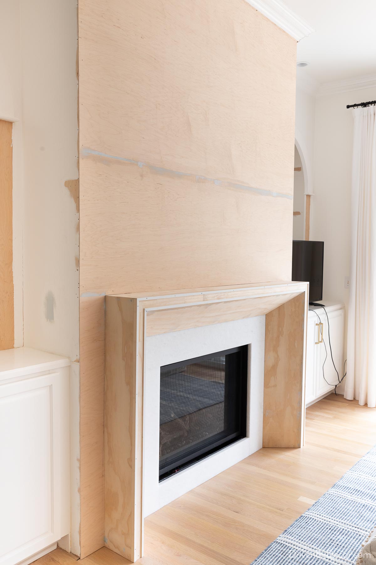 The "Before" And "After" Of Our Circus Room Reno + Fireplace Makeover
